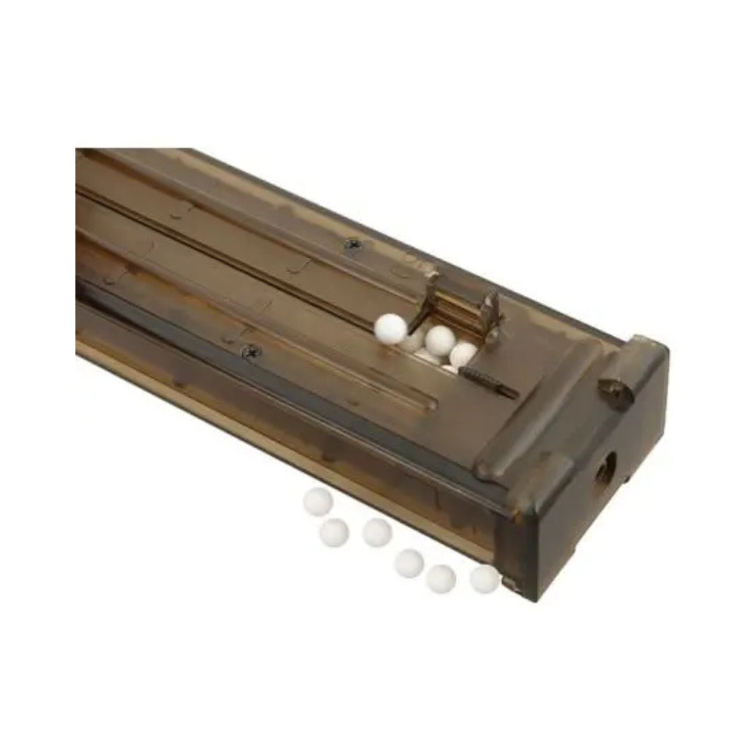 UNYZONE : CYMA Chargeur transparent Hi-Capa 280 billes pour réplique P90 AEG, vue sur la trappe de chargement avec des billes